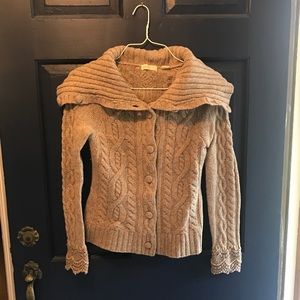 Tan wool sweater with embellished sleeve cuffs